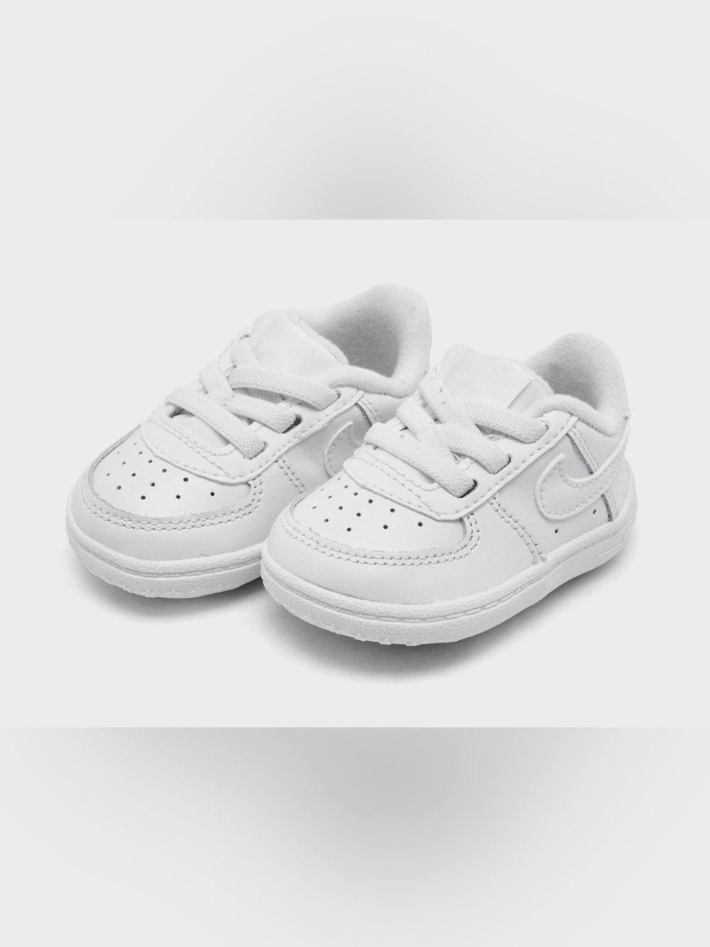 Nike Air Force 1 Classic All White 
Size: 4C (Toddler) Baby’s